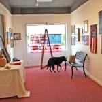 Patrick Webb photos / For the Observer
Nima, a black labrador-border collie mix, checks out a gallery at the Aberdeen Art Center filled with exhibits for the The Art of Resistance, a juried art show on display through September.