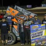 Colton Heath and his family and crew pose for photos after winning in the Summer Challenge Series at the raceway.